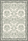 Green floral rug with damask pattern.