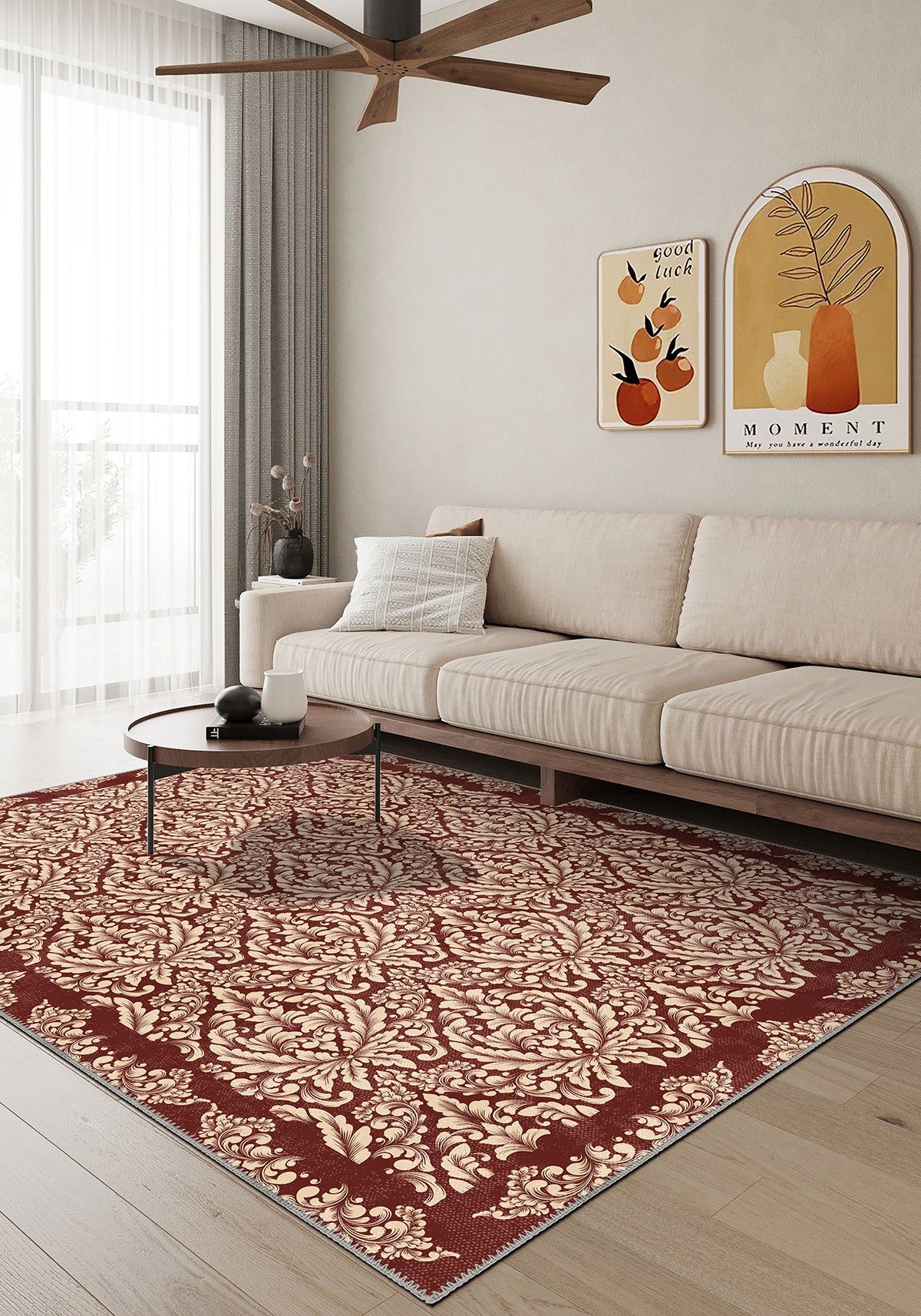 Living room with a beige sofa, patterned rug, and wall art.