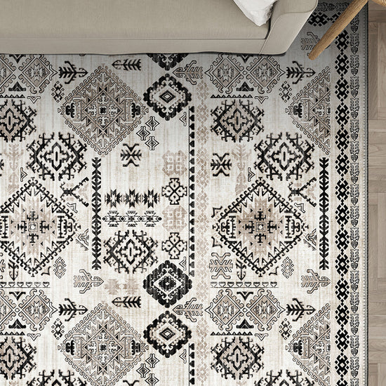 Black and white rug with Anatolian motifs.