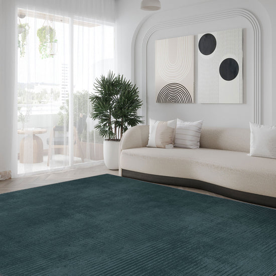 Modern teal rug for living room.