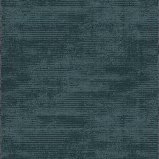Teal rug with a subtle pattern on a plain background