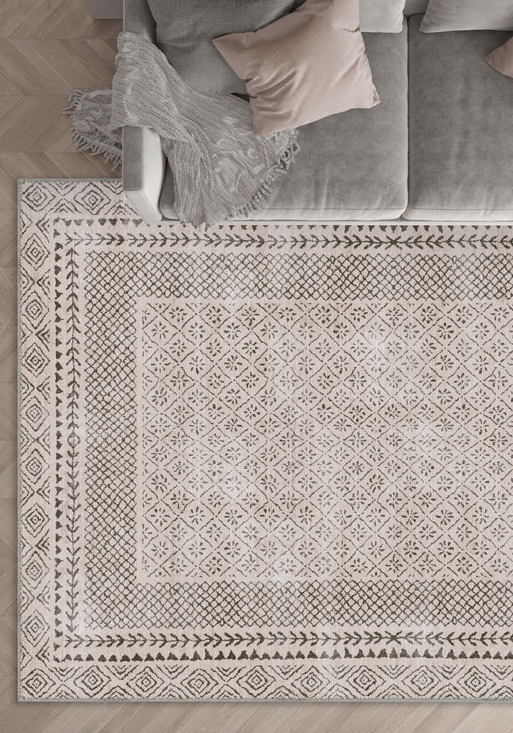 Calyra Bordered Beige Rug