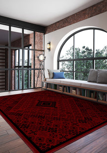 Red patterned rug for living room.