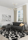cowhide rug with grey sofa