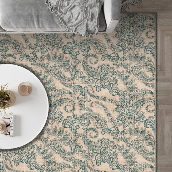 Teal and cream paisley rug for living room.