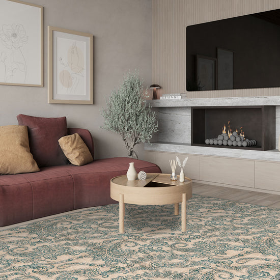 Cream teal paisley rug.