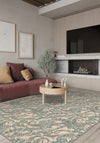 Cream teal paisley rug.