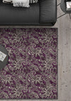 Purple paisley rug with brown details.