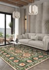 Green bohemian rug with Suzani motifs.