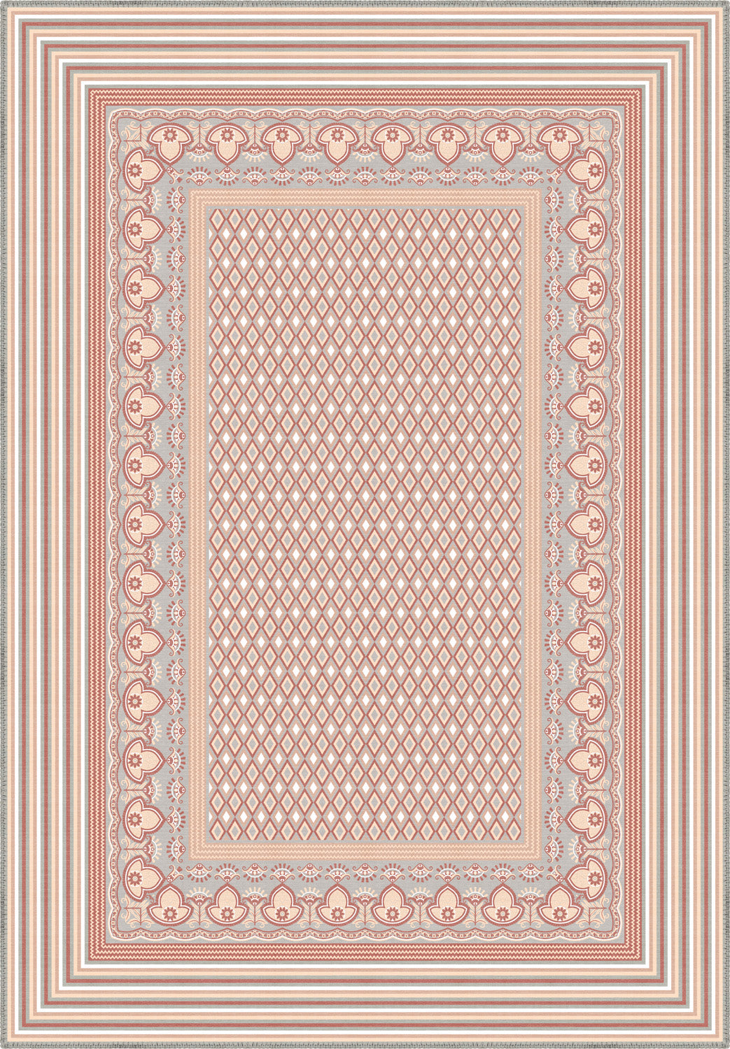 Geometric pink rug for nursery.