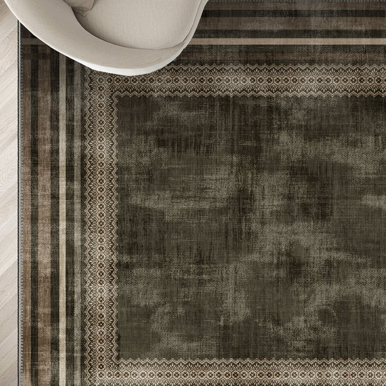 Distressed brown rug for living room.
