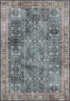 Navy rug with intricate pattern.